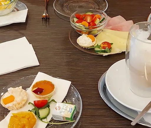 Bild von Le petit café