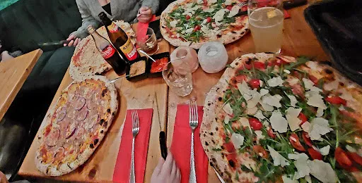 Bild von Mentor's Holzofenpizza Restaurant Bar