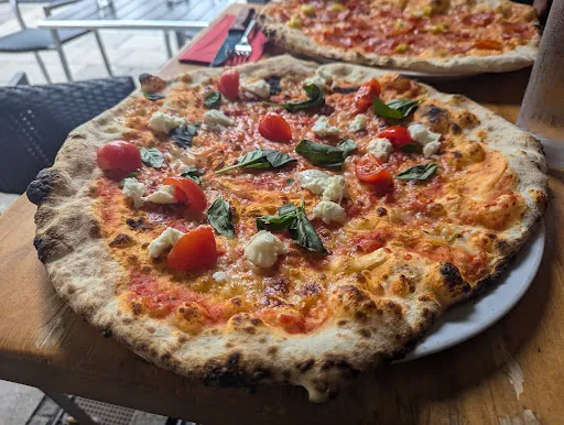 Bild von Mentor's Holzofenpizza Restaurant Bar