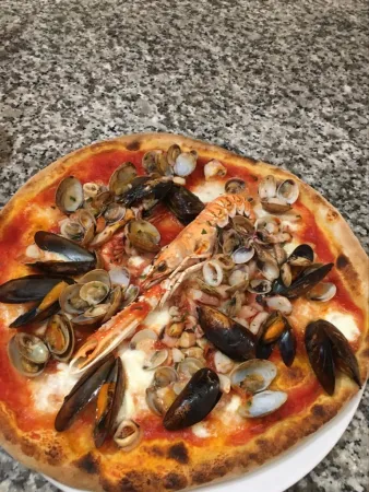 Bild von Al TAVOLIERE “Mangiare, Bere e Comprare ITALIANO“