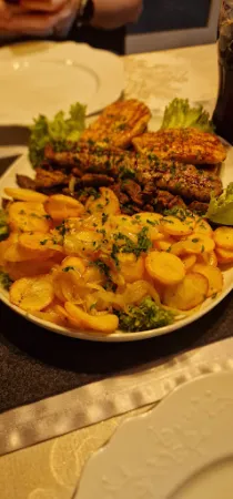 Bild von Romans Holzkohlegrill (ehem. Pizza & Co.)