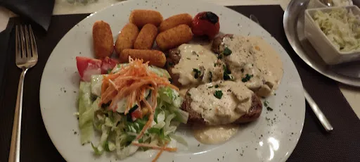 Bild von Romans Holzkohlegrill (ehem. Pizza & Co.)