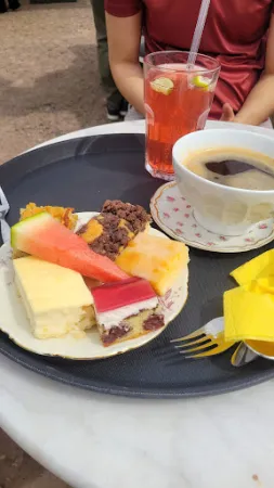 Bild von Blümchen Café