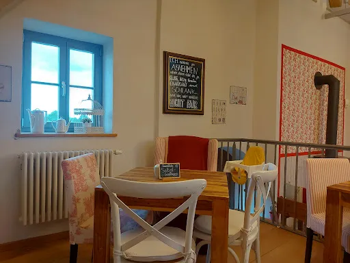 Bild von Blümchen Café