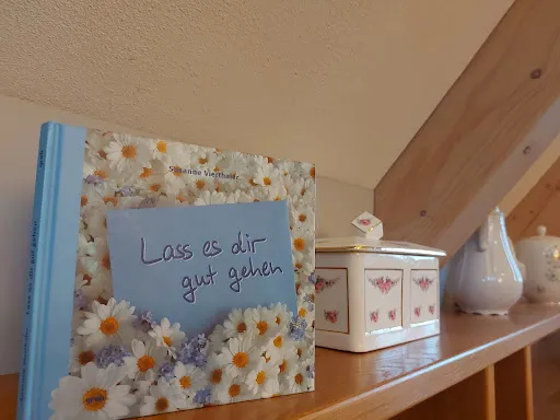 Bild von Blümchen Café
