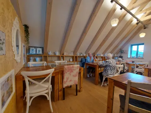 Bild von Blümchen Café