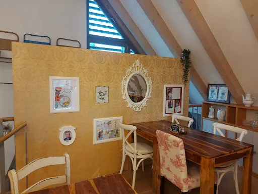 Bild von Blümchen Café