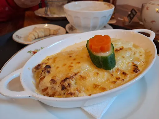 Bild von Blümchen Café