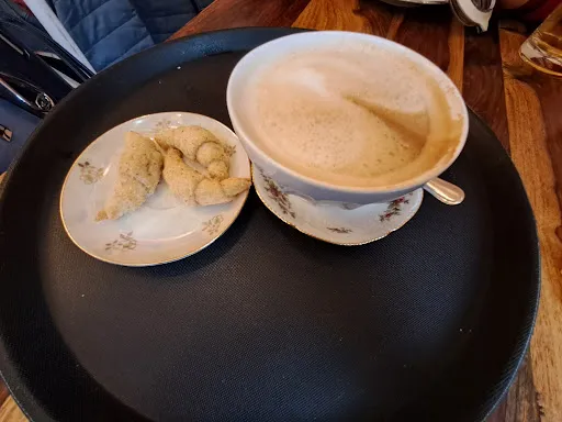 Bild von Blümchen Café