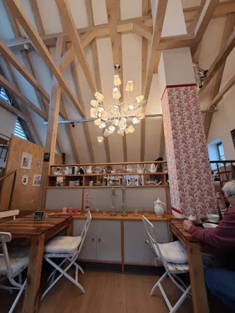 Bild von Blümchen Café