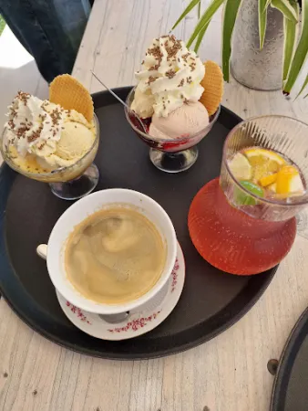 Bild von Blümchen Café