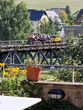 Bild von Blümchen Café