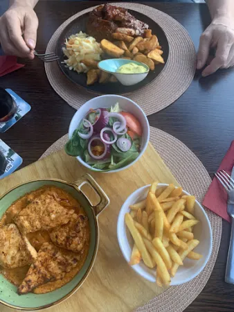 Bild von Holzkohle Grillhaus