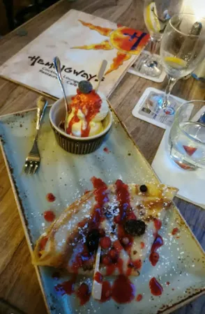Bild von Hemingways Cocktail Lounge Restaurant Café