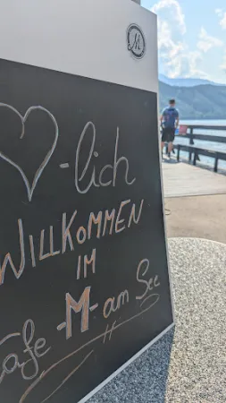 Bild von Das M am See